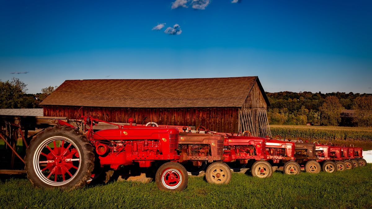 Old barn with vintage tractors