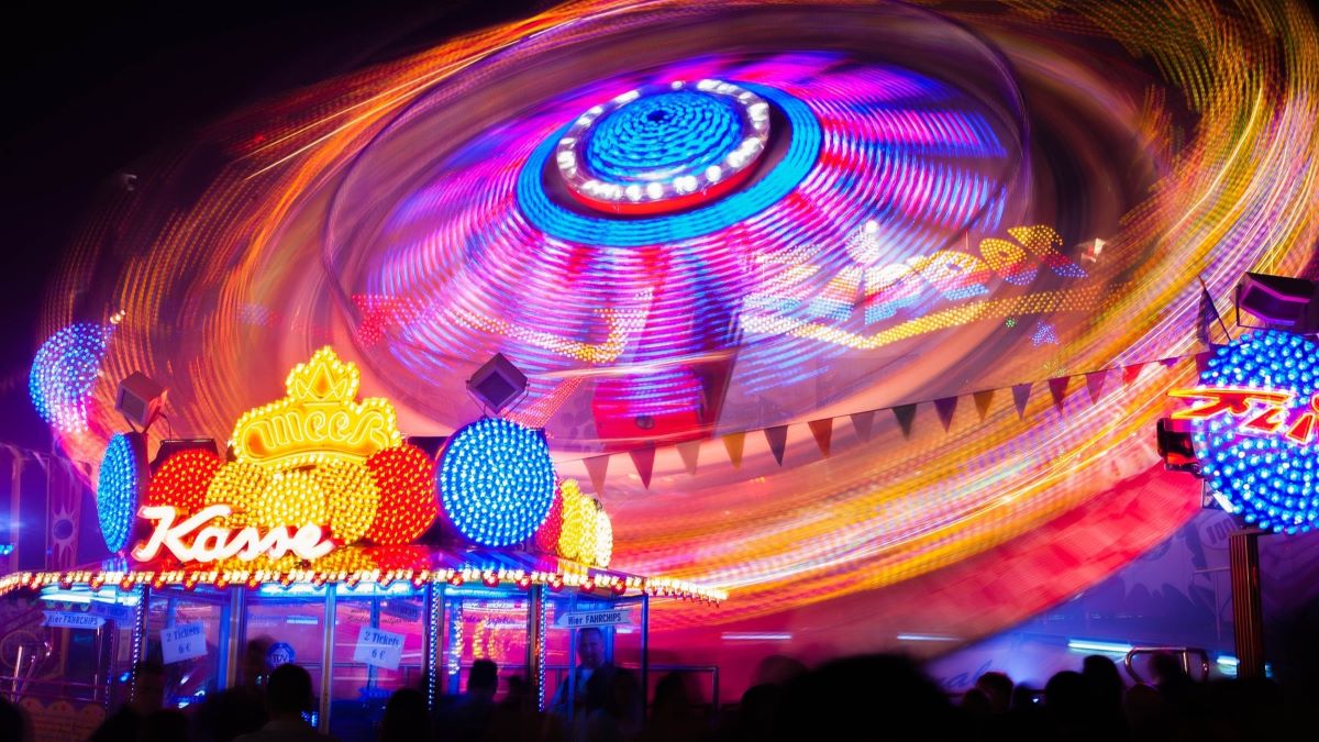 revolving carousel at night with lights